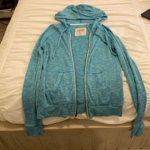 blue zip up hoodie
